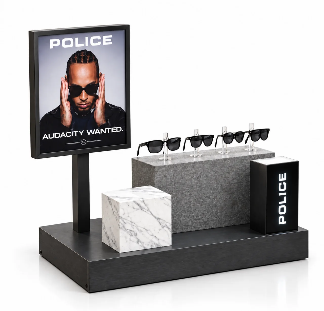 Expositor modular de sobremesa fabricado para Police, con la campaña "Audacity Wanted" protagonizada por Lewis Hamilton, en mármol, metal cepillado y grafismo retroiluminado